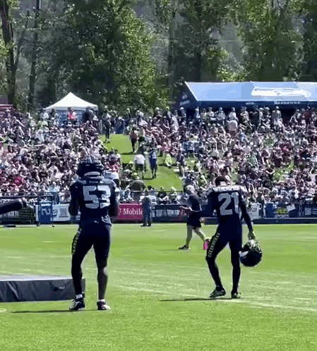 Crowd Around Bear Mascot Saying Go Bears GIF
