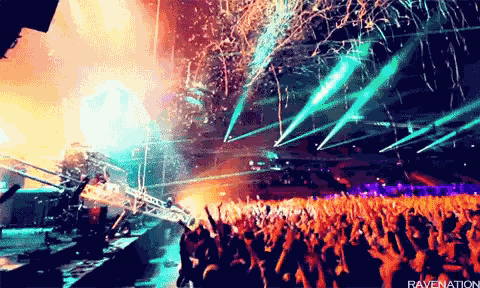 Crowd at Concert Throwing Confetti