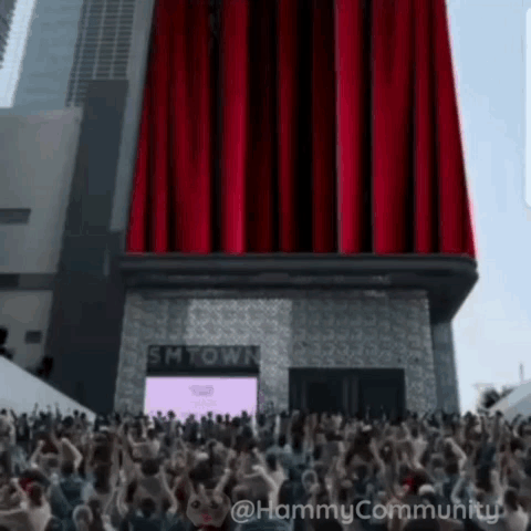 Crowd Gathered At SMTown Building GIF