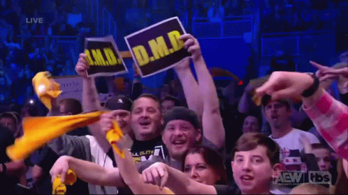 Crowd Holding D.M.B. Signs