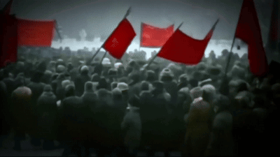Crowd Holding Red Flags Including Freedom