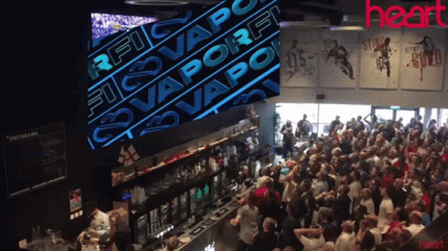 Crowd In Bar With Rfc Vaporfi Sign GIF