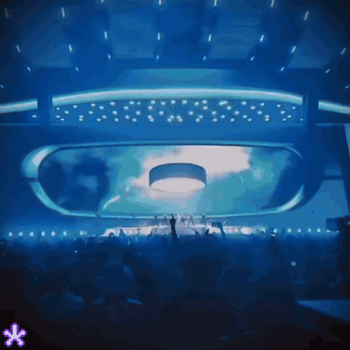 Crowd In Dark Room With Blue Light GIF