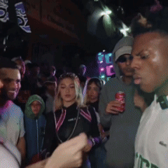 Crowd In Dark Room With Soda Can GIF