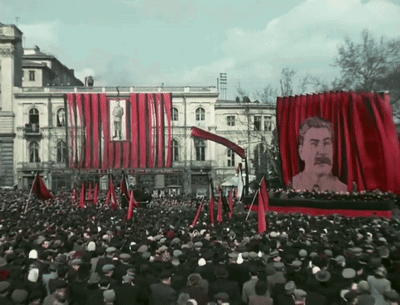 Crowd In Front Of Red Curtain With Man GIF