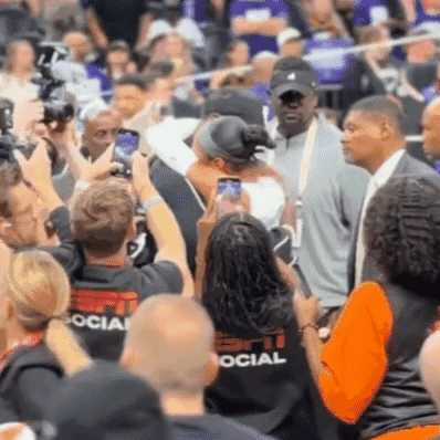 Crowd in Stadium With Person Wearing Social Shirt