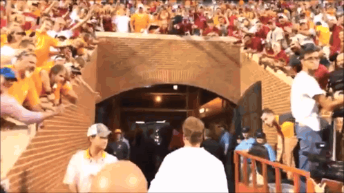 Crowd in Tunnel Saying Sunshine Dome