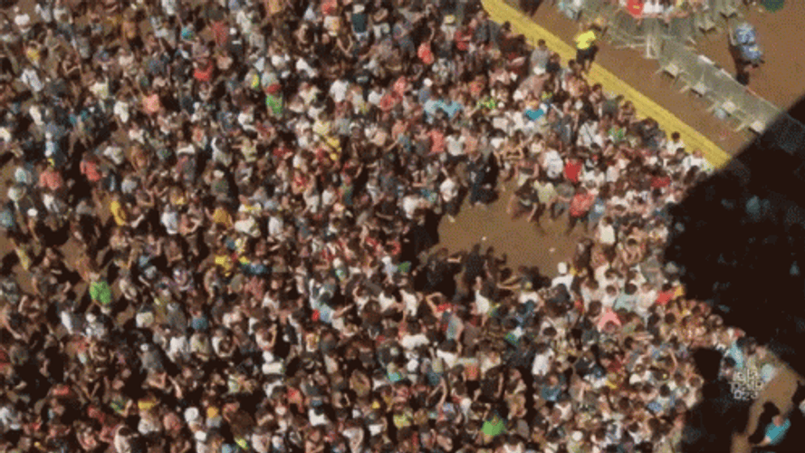Crowd Rushing In Center Mosh Pit GIF