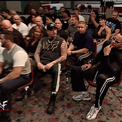 Crowd Sitting With Man In Uf Shirt GIF