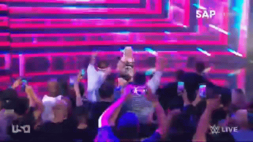 Crowd Standing In Front Of Stage Saying Sap GIF