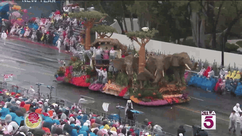 Crowd Watching Parade With KTLA 5 Sign