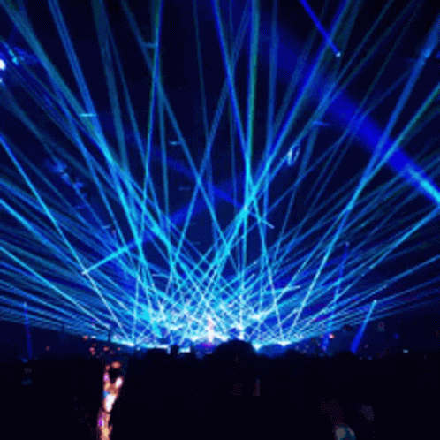 Crowd Watching Show with Blue Lights