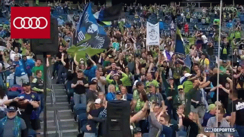 Crowd Watching Soccer Game With Fox Deportes Logo GIF