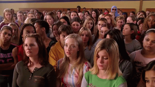 Crowd With Girl in Angel Shirt