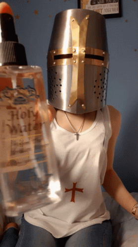 Crusader Girl Sprays Holy Water Perfume GIF