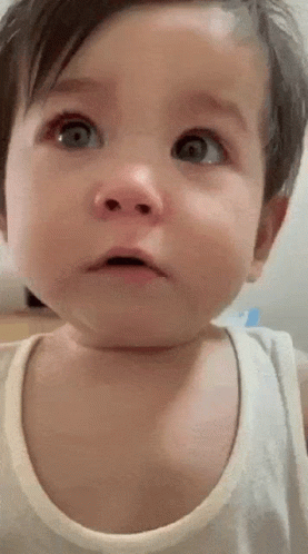 Baby Cry Covering One Eye GIF