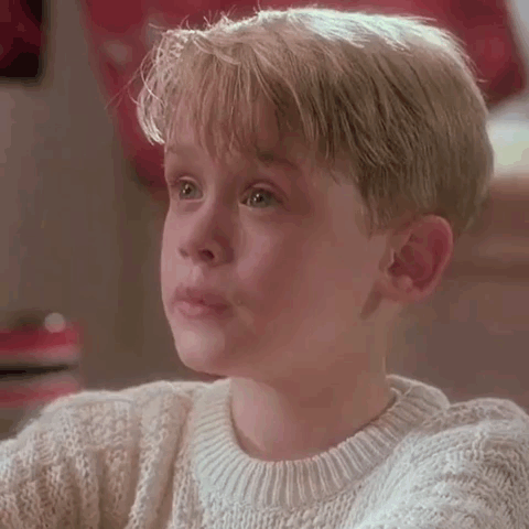 Crying Boy in White Sweater