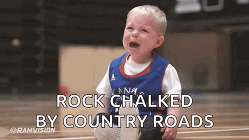 Crying Boy on Basketball Court Rock Chalked by Country Roads