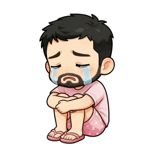 Crying Man With Beard and Hands on Knees