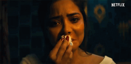 Crying Woman Holding Piece of Bread