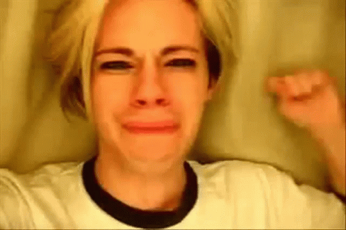 Crying Woman Making Funny Face in White Shirt