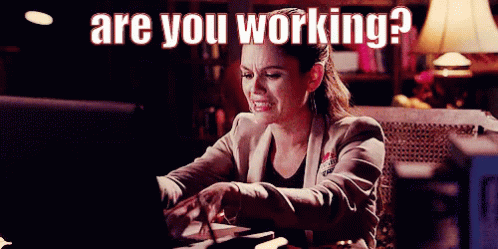 Crying Woman Pretending To Work Are You Working GIF