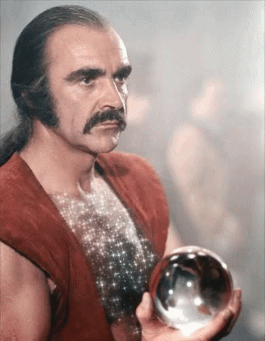 Zardoz Holding A Crystal Ball GIF