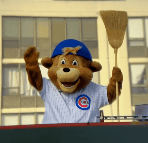 Cubs Mascot Holding Broom