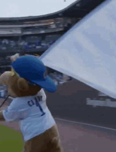 Cubs Mascot Waving Flag To Win GIF