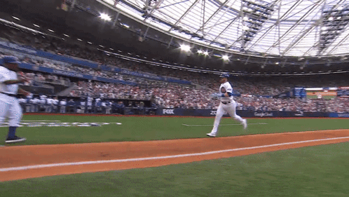 Cubs Player Ian Happ Running To Base After Win GIF
