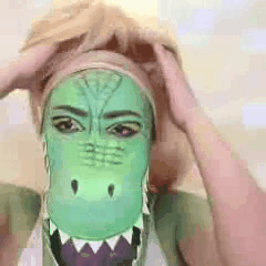 Cuca Wearing Blonde Wig GIF