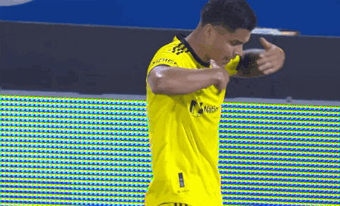 Cucho Hernandez Brushing Off His Shirt GIF
