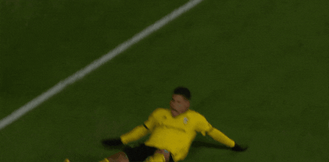 Cucho Hernandez Sliding On Field While Sitting GIF