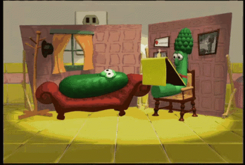 Cucumber Sitting on Couch and Asparagus Reading Book