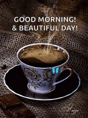 Cup of Coffee on Saucer With Butterfly