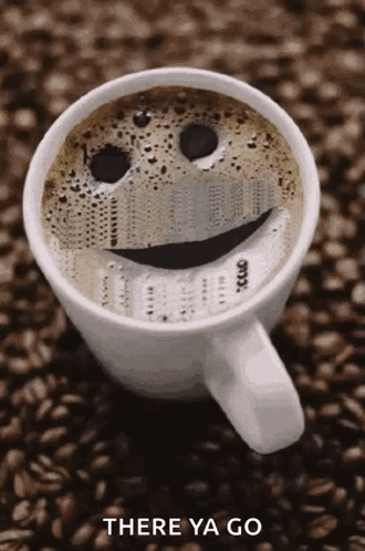 Cup of Coffee With Smiley Face There Ya Go