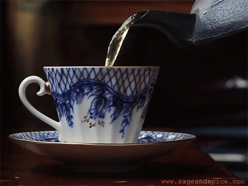 Cup Of Tea Poured Into Saucer Www.sageandspice.com GIF