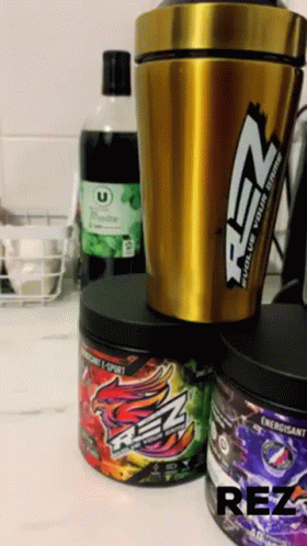 Cup Saying Rez on Bottle of Soda