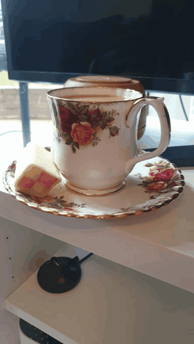 Cup with Roses on Saucer