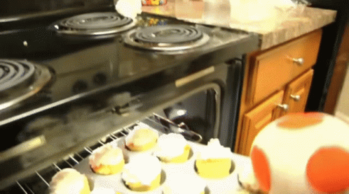 Cupcakes Baking On Stove GIF