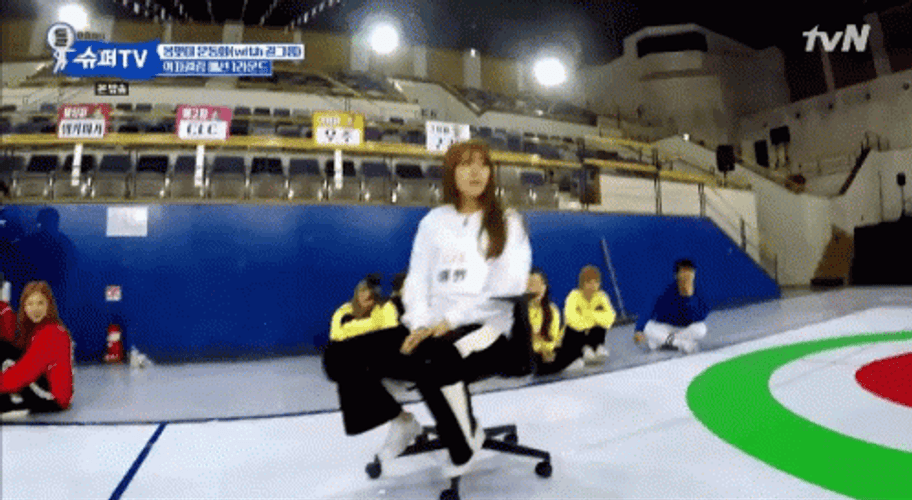 Curling In Office Chair Game GIF