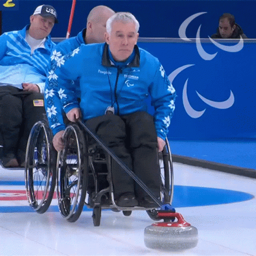 Curling In Wheelchair GIF
