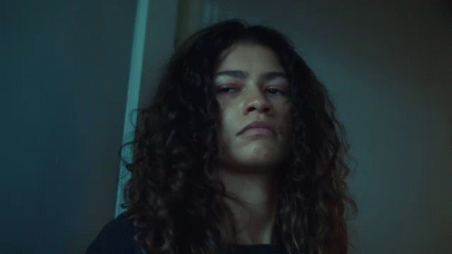 Curly Hair Woman Serious Look At Camera GIF
