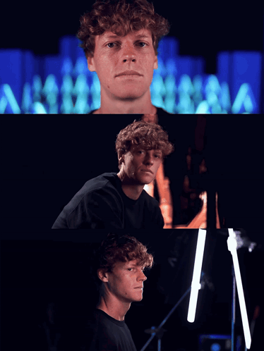 Curly-Haired Man Looking At Camera Dark Room GIF