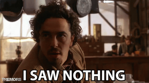 Curly Haired Man Says I Saw Nothing Tremors GIF