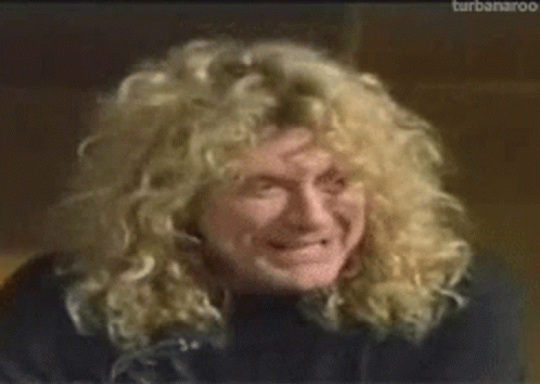 Curly Haired Man Smiling Eyes Closed GIF