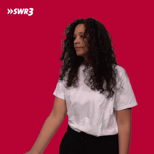 Curly-Haired Woman White T-Shirt Black Pants Red SWR3
