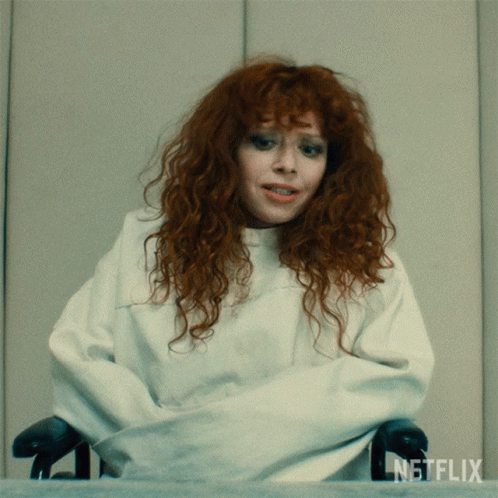 Curly Lady Pulling Straight Jacket GIF