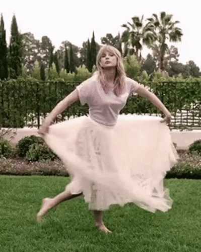 Playful Curtsy Taylor Swift White Dress GIF
