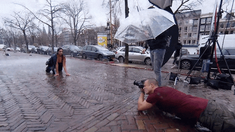 Curvy Model Photoshoot In The Rain GIF